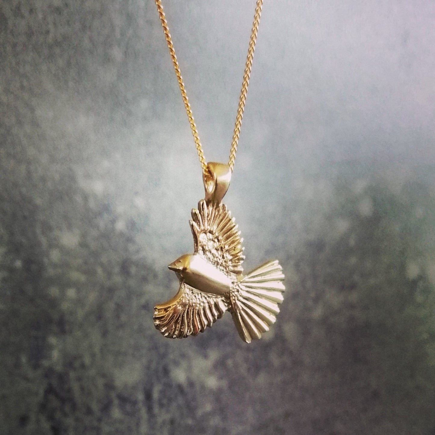 Vosso gold piwakawaka necklace