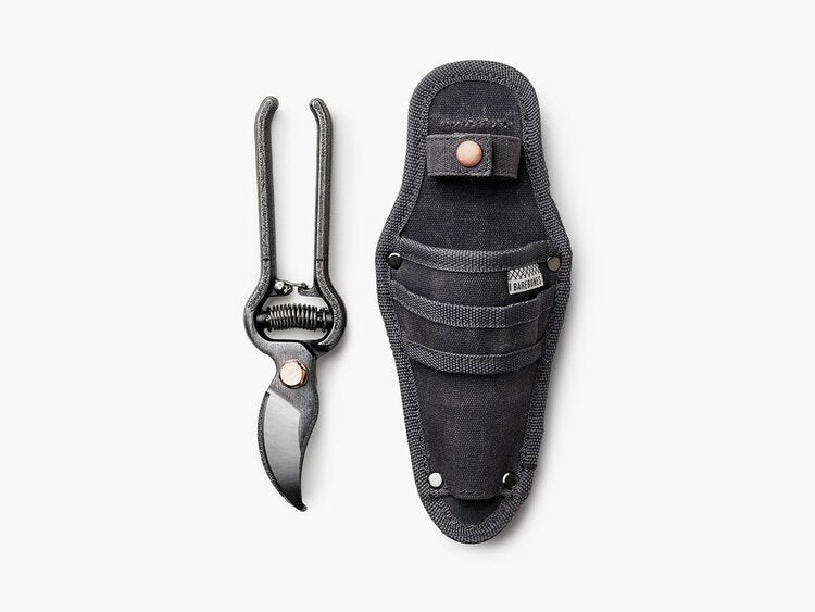 Pruner with sheath