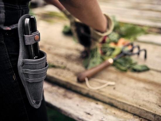 Pruner with sheath
