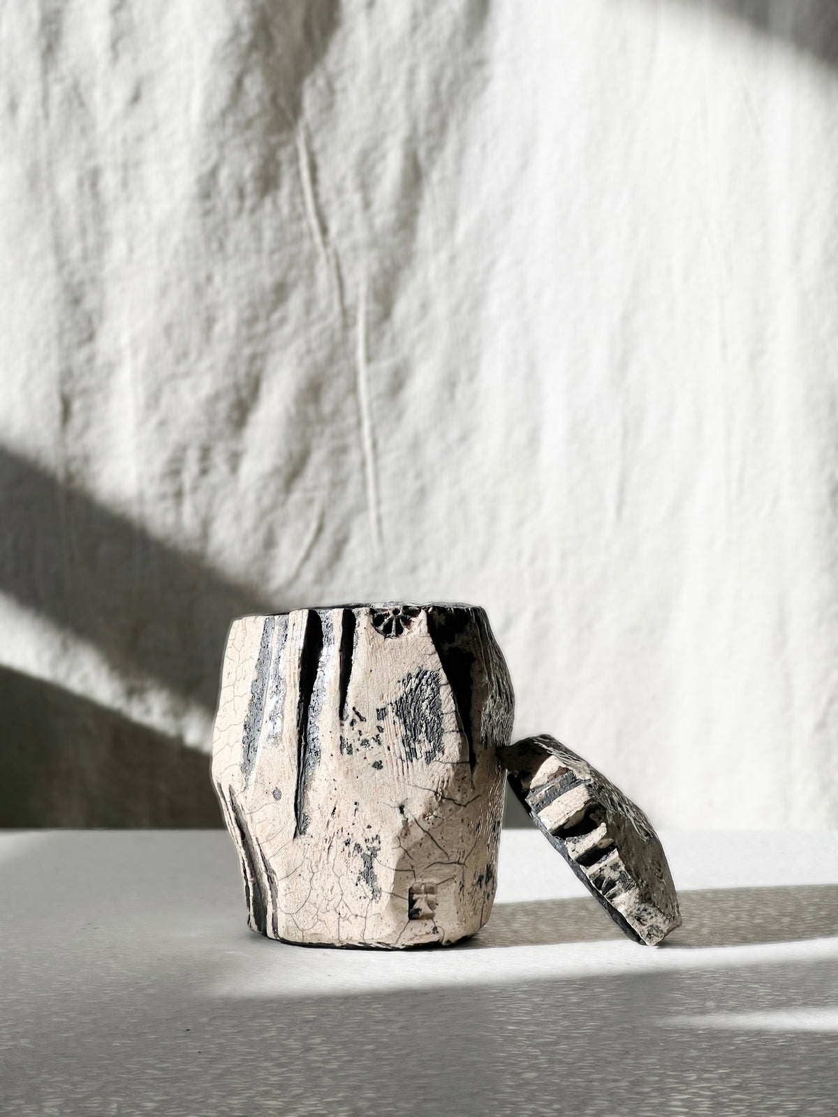 Raku lidded container