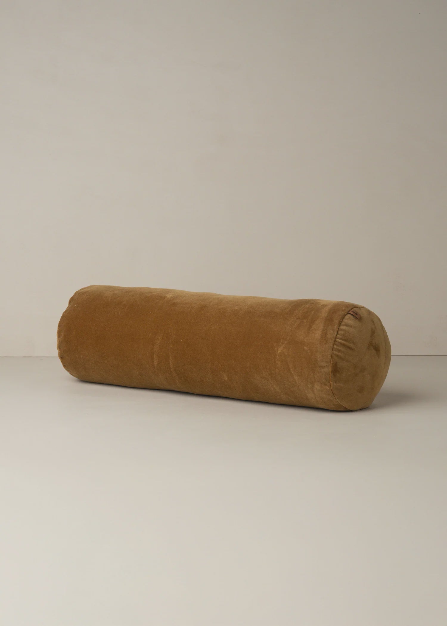 Velvet structured bolster cushion