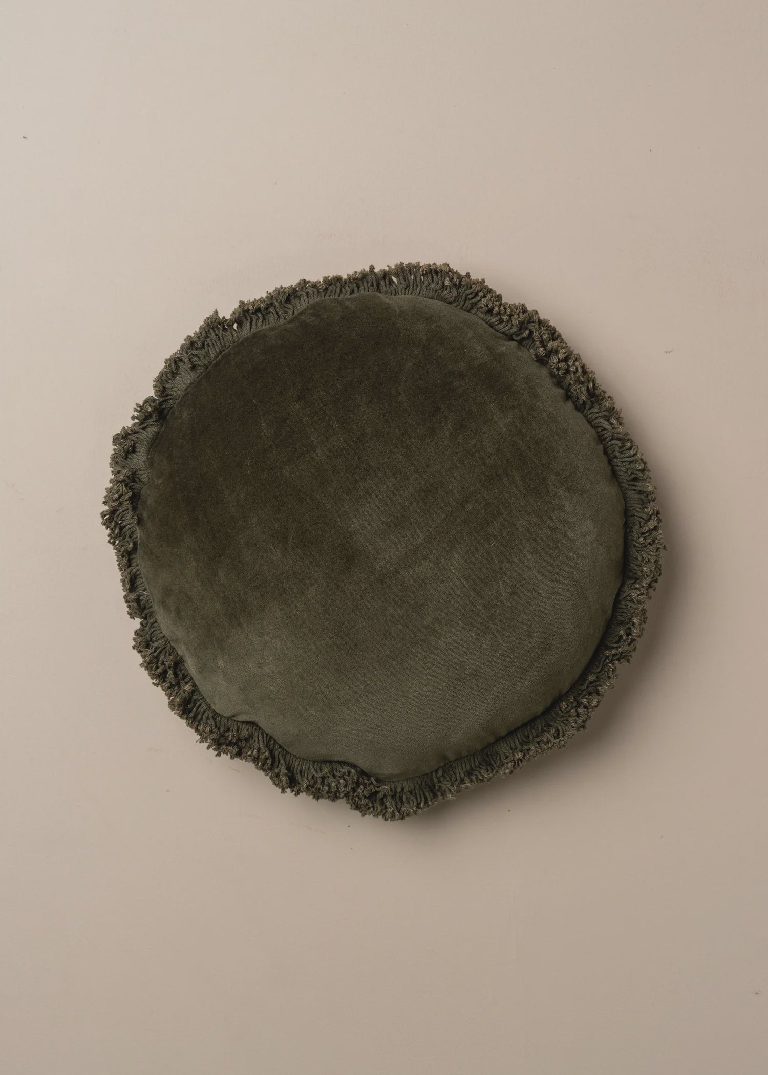 Velvet round fringed cushion