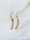 Audrey loves Ruby kowhai earrings