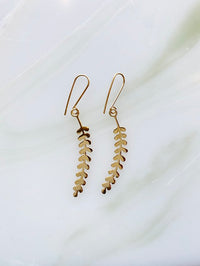 Audrey loves Ruby kowhai earrings