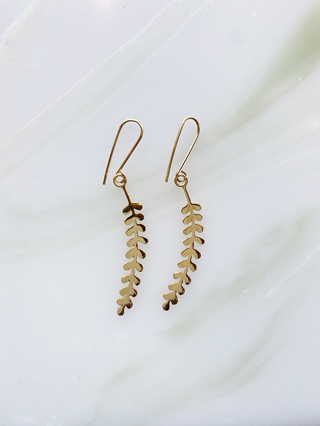 Audrey loves Ruby kowhai earrings