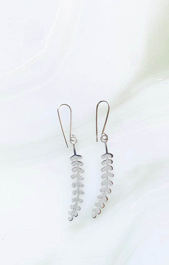 Audrey loves Ruby kowhai earrings