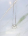 Audrey loves Ruby lotus necklace